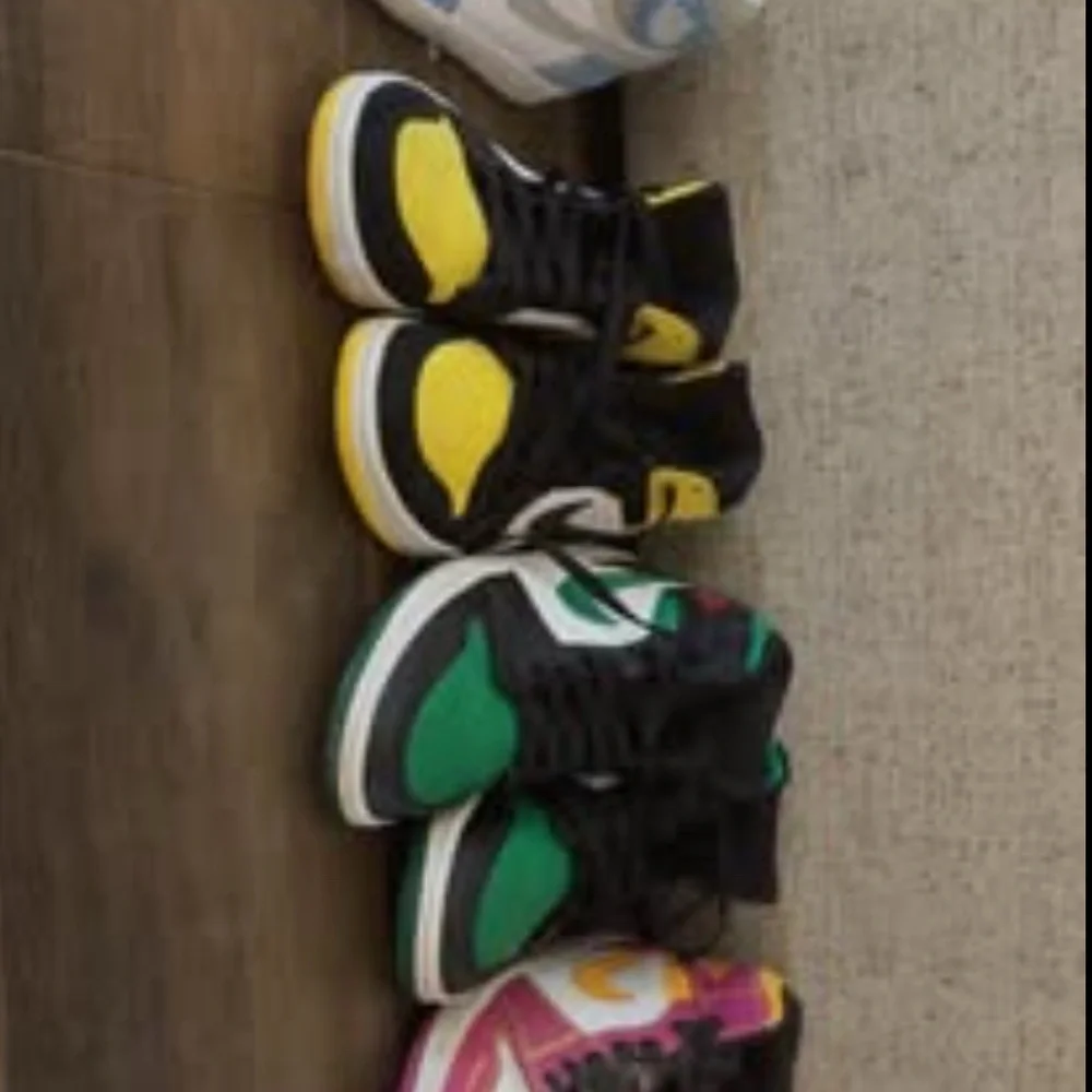 Four Jordan High-Top Sneakers in  various colors
